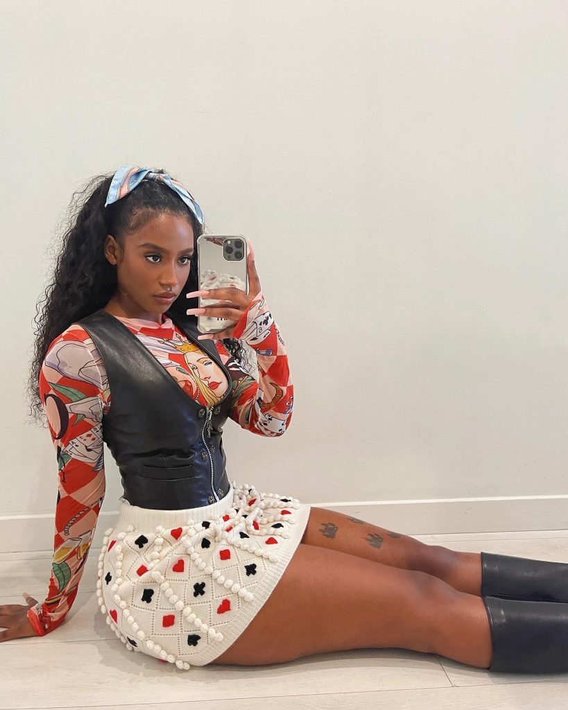 how old is Raven Tracy